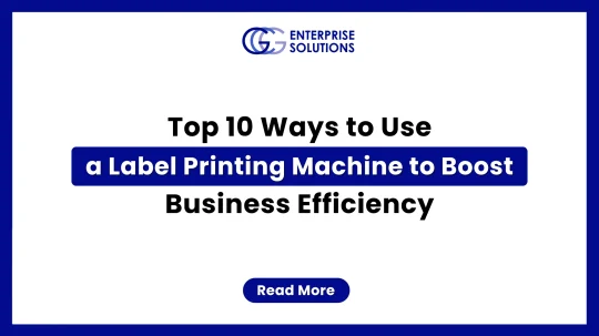 A clean, minimalist corporate web banner featuring a solid blue outer border and a stark white background, displaying bold text detailing the top 10 ways to use a label printing machine to boost business efficiency underneath the GCG Enterprise Solutions logo.